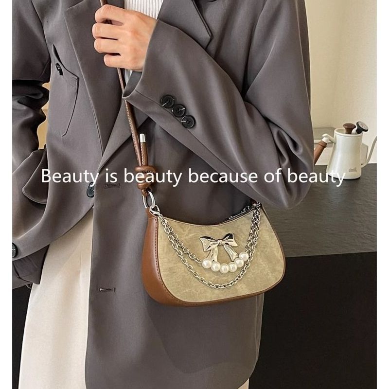 高品質人気販売卸売ニッチデザインパールボウ軽量ショルダーバッ - Luxury Bags In China Wholesale のレビューと価格